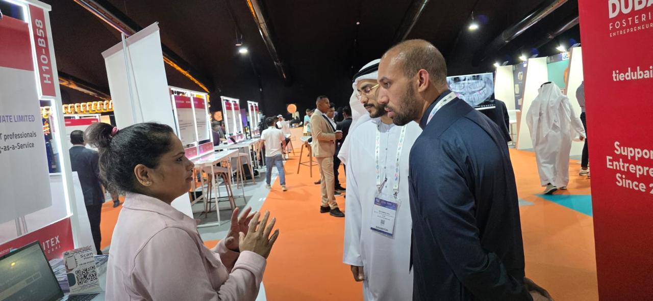 A conversation at an exhibition stand at GITEX Global 2025